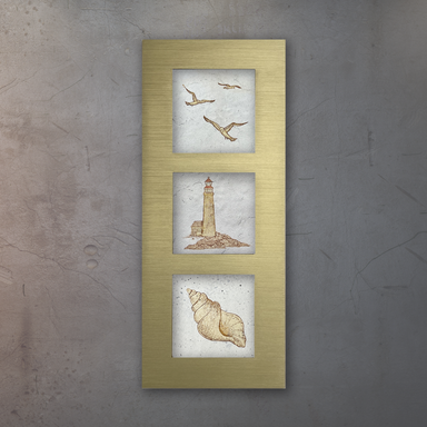 A trio of coastal images created on beige porcelain tile mounted in a gold colour anodized aluminum frame