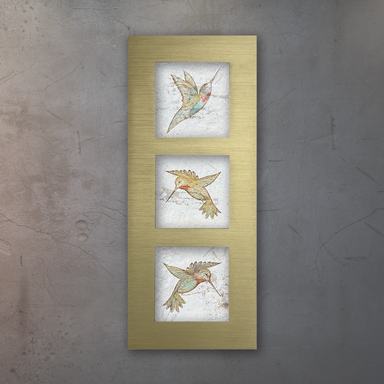 A trio of three different delicately coloured hummingbirds on beige porcelain tile mounted in a gold anodized aluminum frame