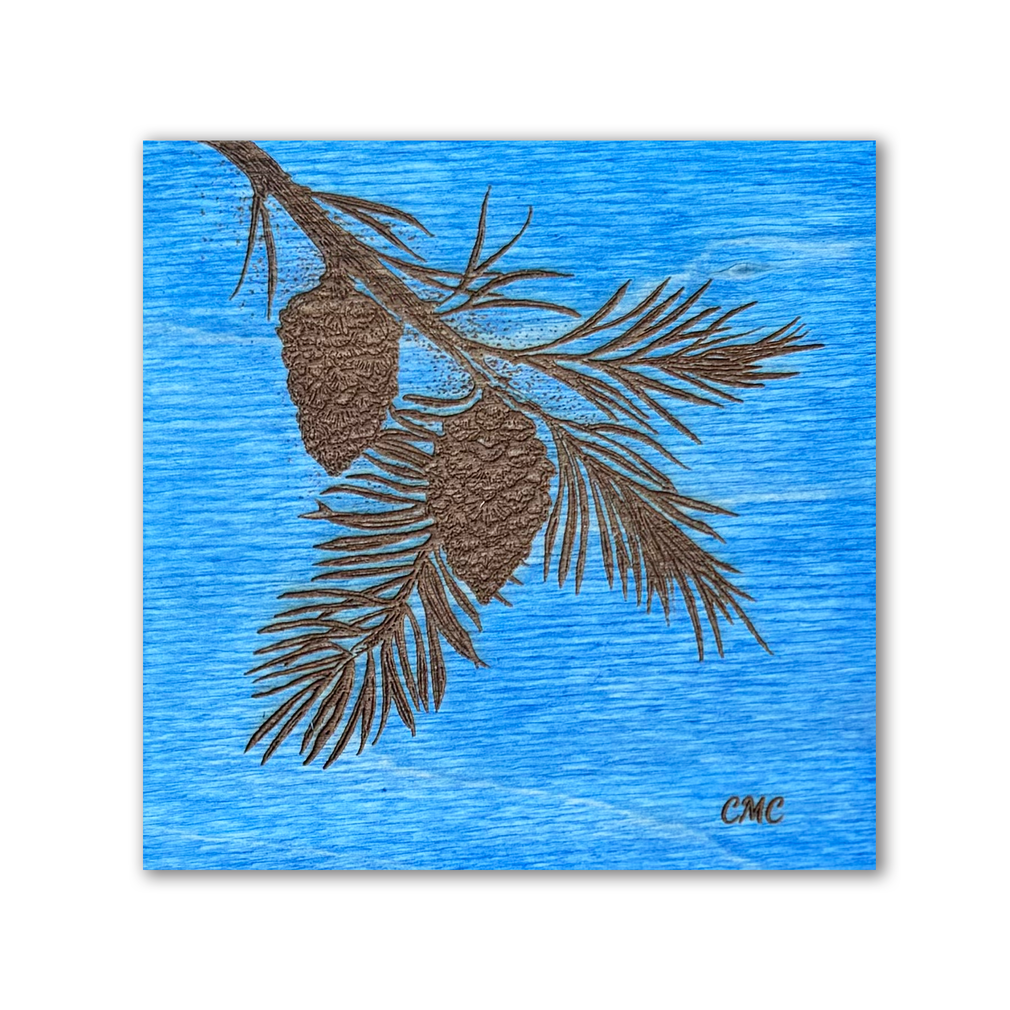Original Design Laser Engraved pine bough on blue stain baltic birch tile