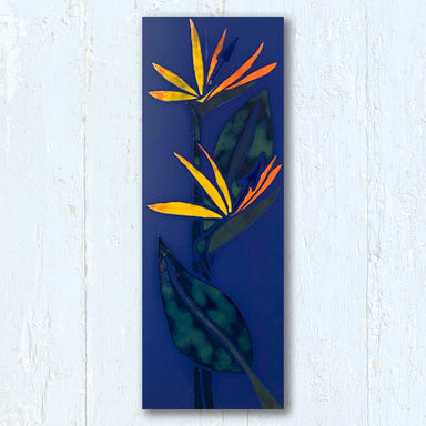Glazed and Fired brightly coloured Bird-of-Paradise flower on a cobalt blue porcelain tile